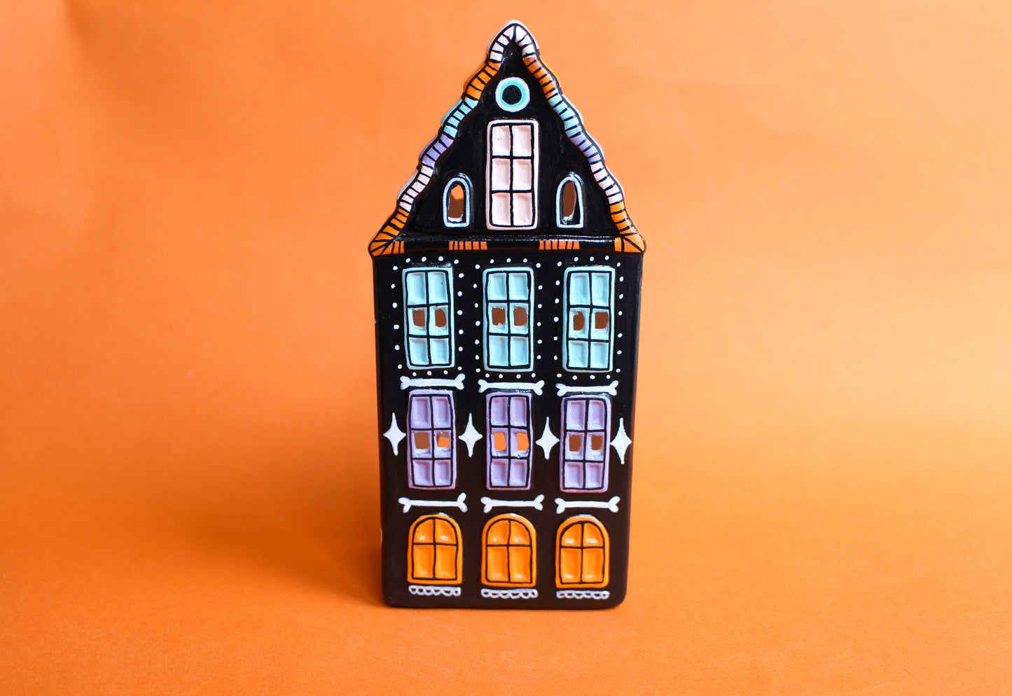 Tall Ceramic Tealight House - black with purple/orange/blue